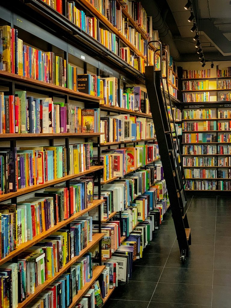 a-long-row-of-books-on-shelves-in-a-library-7eqdr9ue-m